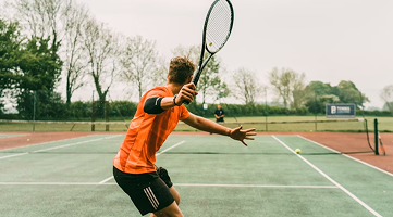 Tennis player serving